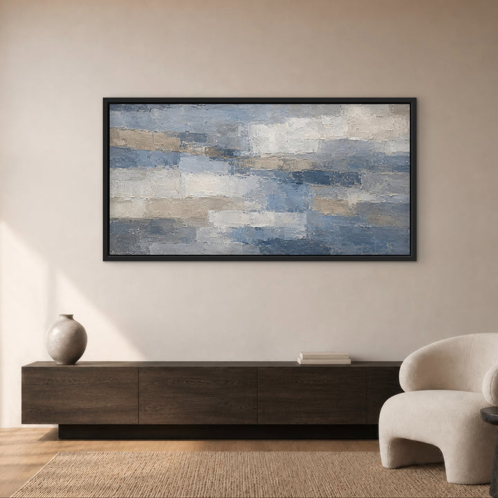 Denim Quarry blue grey panoramic abstract framed canvas above a warm wood console