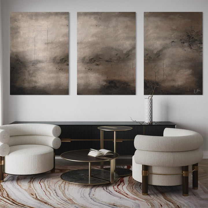 Elegant Modern Home Interior Wall Art Styled With Curved Cream Lounge Chairs, Black Console, And Marble Accent Tables. Perfect For A Modern Luxury Living Room.