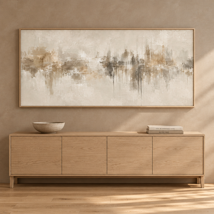 Neutral Depths warm neutral panoramic framed canvas in a natural oak frame above a pale oak sideboard
