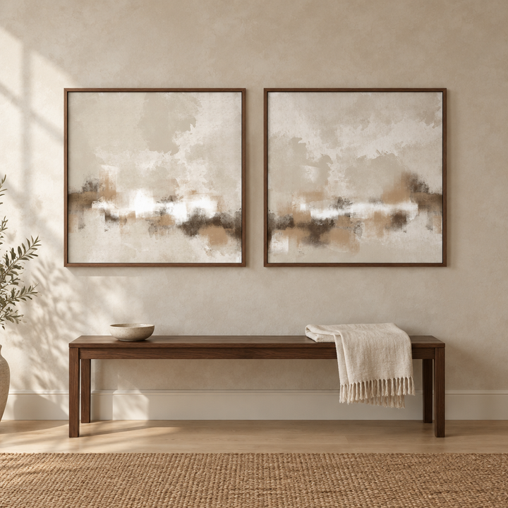 Sorrento set of two neutral abstract framed canvases in brown wooden frames above a walnut entryway bench