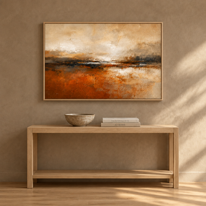 Sienna Drift rust and cream framed canvas in a natural oak frame above a pale oak console