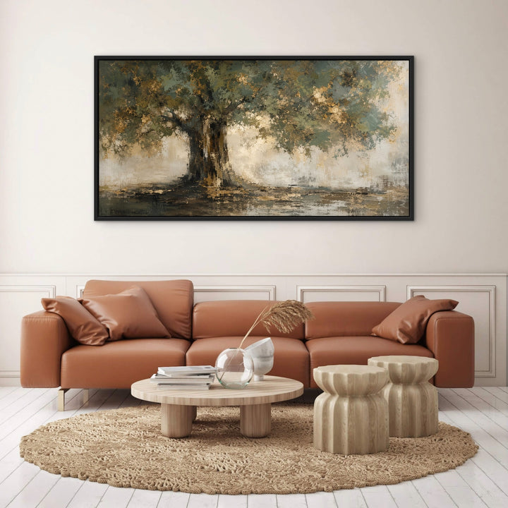 Gilded Canopy green and gold framed canvas above a terracotta leather sofa