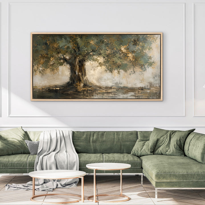 Gilded Canopy panoramic green canvas in a natural wood frame above a sage sofa