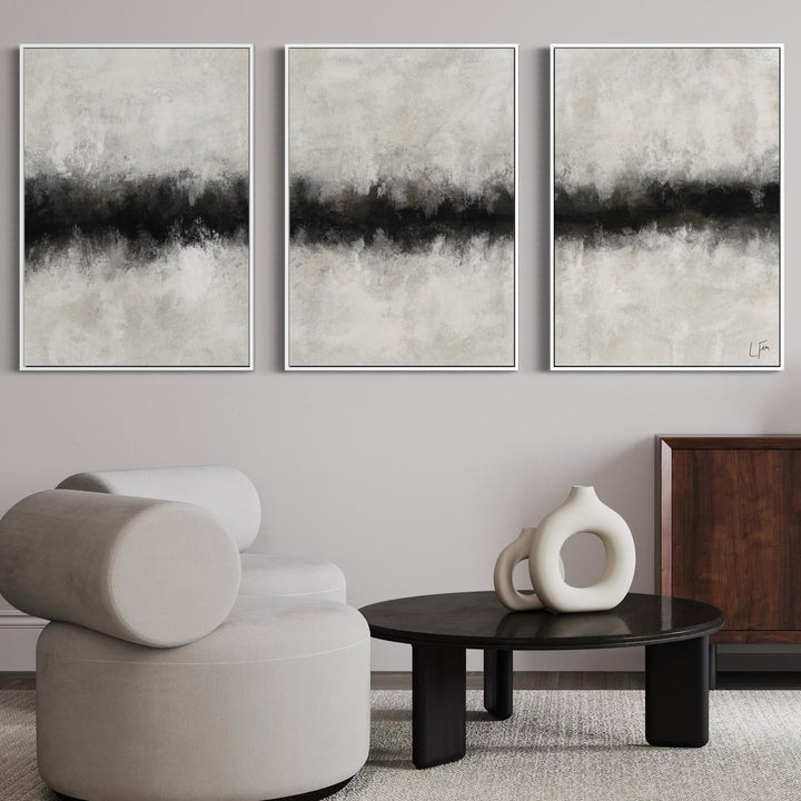 Modern Minimalist Abstract Wall Art Styled With A Curved Cream Lounge Chair, Black Round Coffee Table, And Sculptural Ceramic Decor. Perfect For A Contemporary Living Room.
