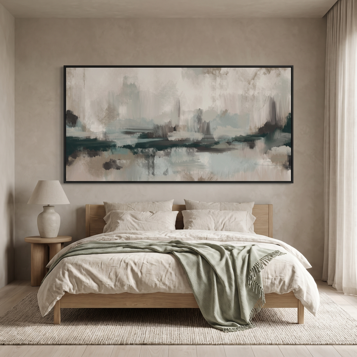 The Forest panoramic framed canvas in black frame above an oak bed with linen bedding - sage green and teal abstract wall art