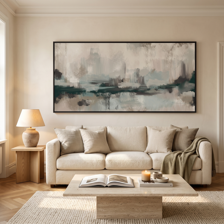 The Forest panoramic framed canvas in black frame above a cream boucle sofa - sage green and teal abstract wall art