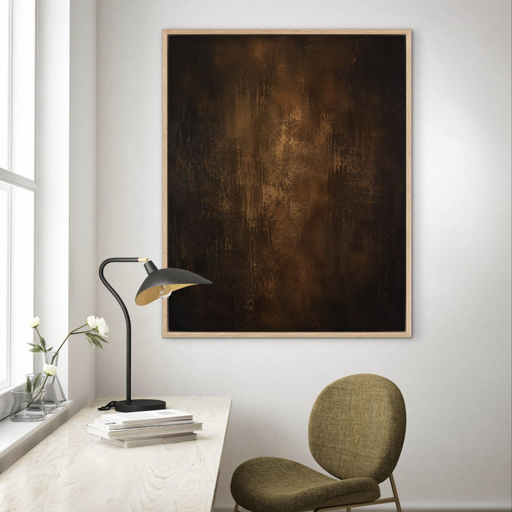 Umber Monolith dark brown abstract framed canvas in study, natural frame
